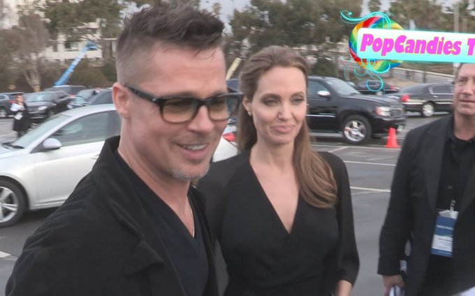 Brad Pitt & Angelina Jolie greet fans while departing 2014 Film Independent Spirit Awards